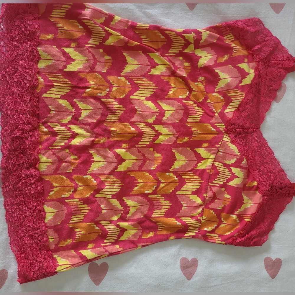 Route 66 y2k tank top, size M/L, and color is mostly pink with orange and yellow